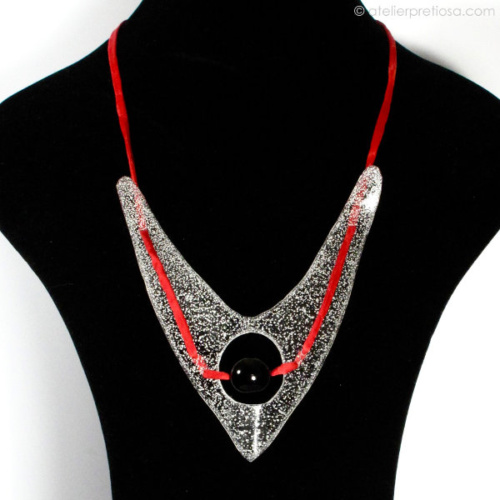 Ketting met onyx en gebogen schild